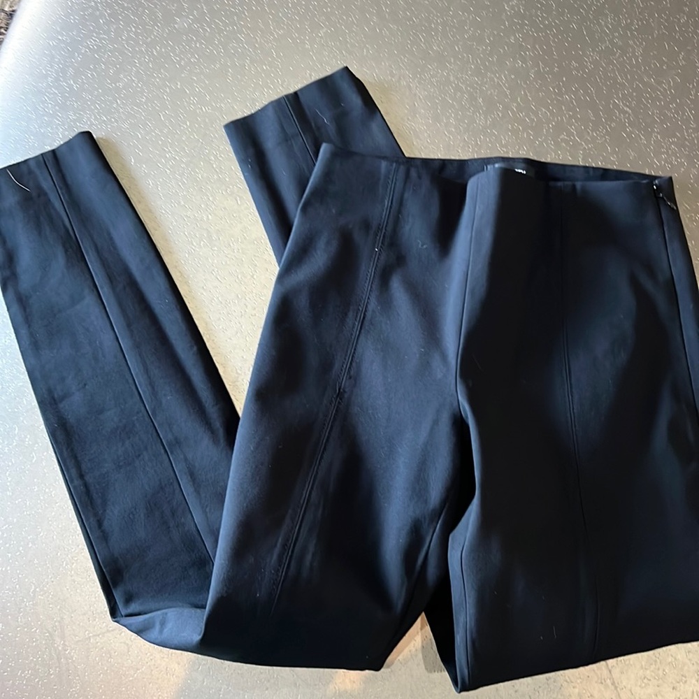 Theory black size 0 pants with front slit. EUC